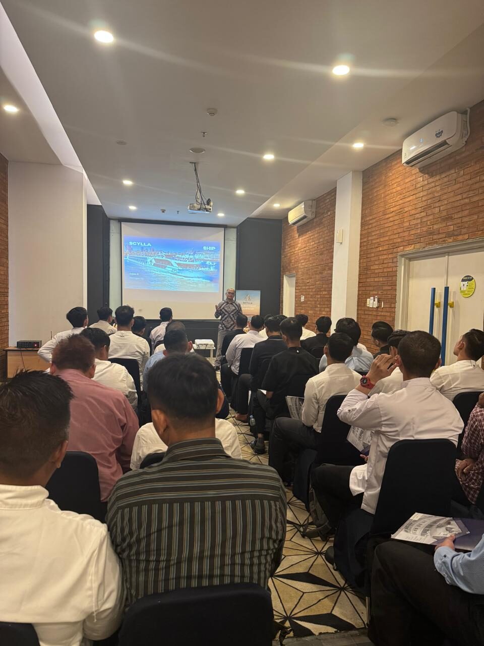 Director leading a training session for candidates